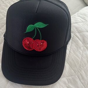 Black Trucker Hat with Sequin Cherry Design.  Made by Blssd. Brand new, no tags